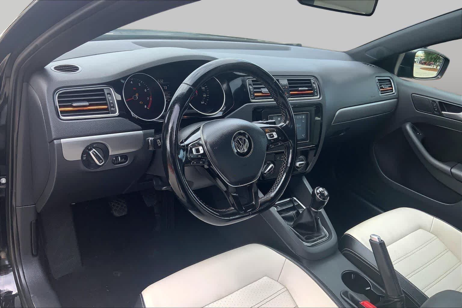 Used 2016 Black Uni Volkswagen 1.8T Sport image 18