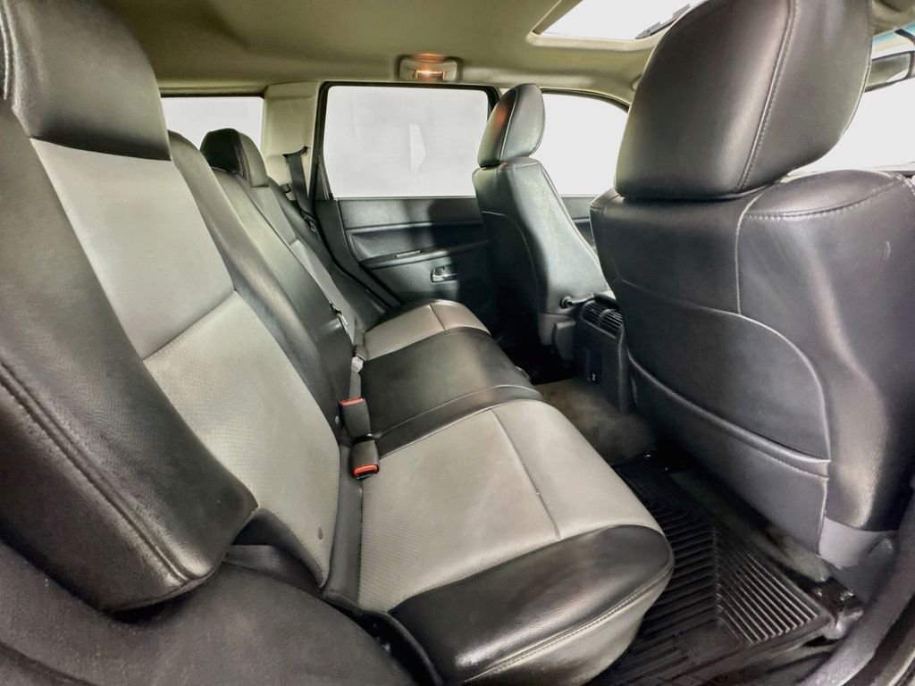Used 2010 Light Graystone Pearlcoat Jeep Laredo image 33
