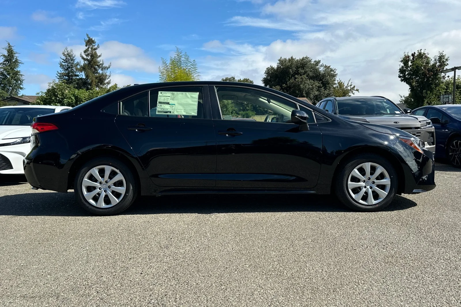 New 2026 Black Toyota LE image 9