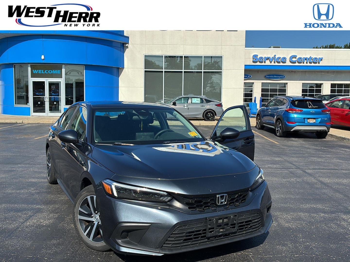 Used 2023 Meteorite Gray Metallic Honda LX image 1