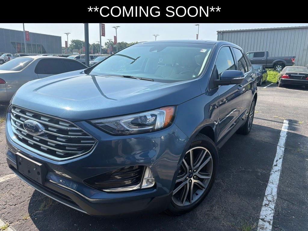 Used 2019 Blue Ford Titanium image 1