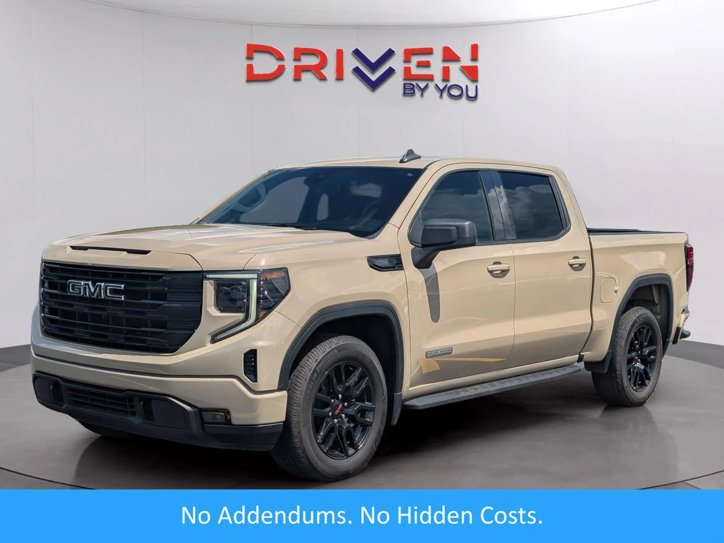 Used 2023 Desert Sand Metallic GMC Elevation image 1