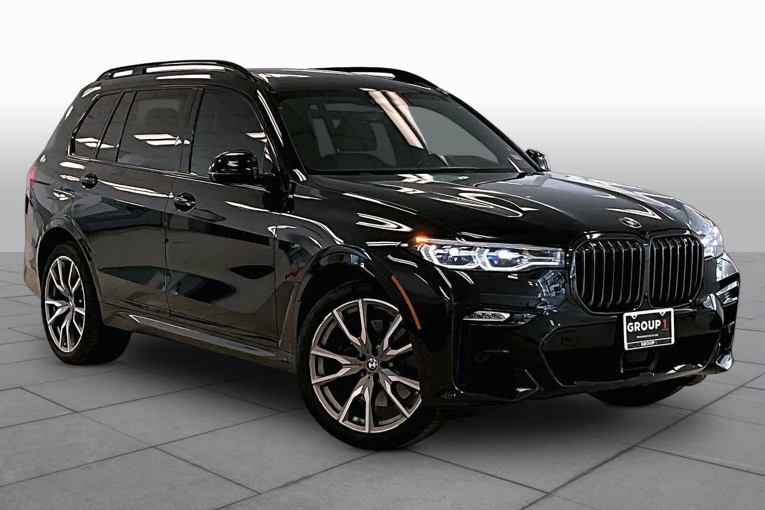 Used 2022 Black Sapphire Metallic BMW M50i image 2