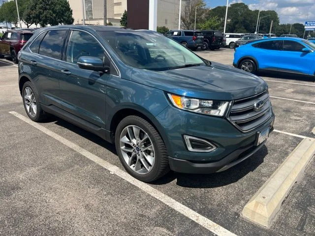 Used 2016 Blue Ford Titanium image 2