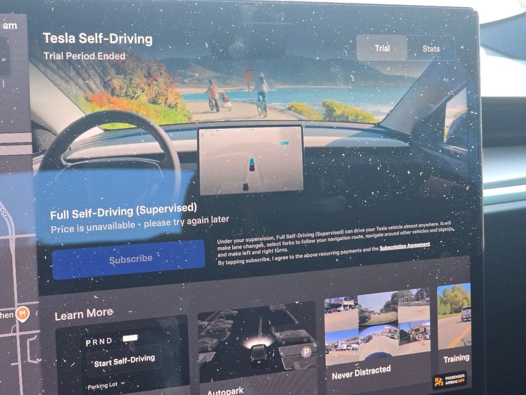 Used 2024 Solid Black Tesla Plaid image 27