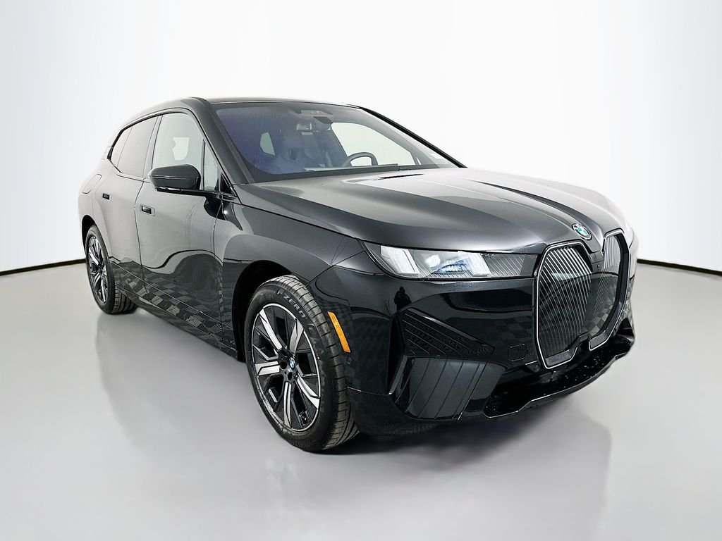 Used 2026 Black Sapphire Metallic BMW xDrive60 image 3