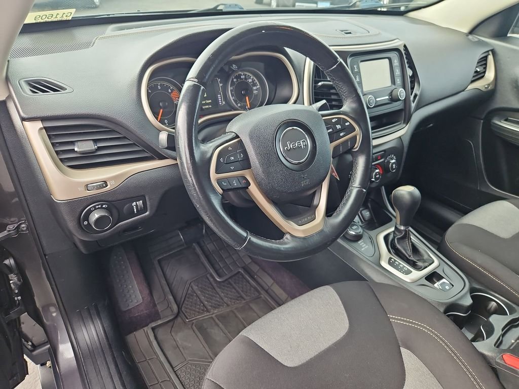 Used 2016 Granite Crystal Metallic Clearcoat Jeep Sport image 13