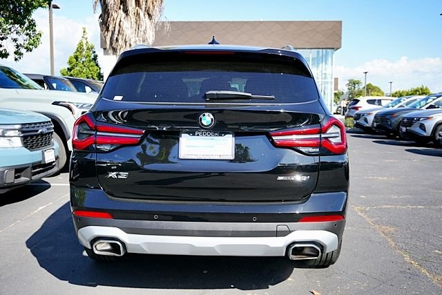 Used 2024 Black BMW sDrive30i image 9