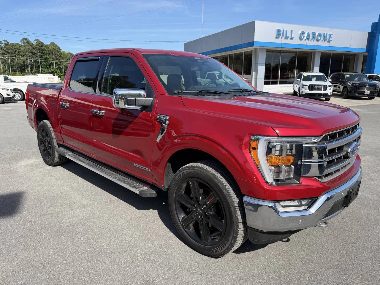 Certified Used 2023 Red Ford Lariat 4x4 4dr SuperCrew 5.5 ft. SB image 7
