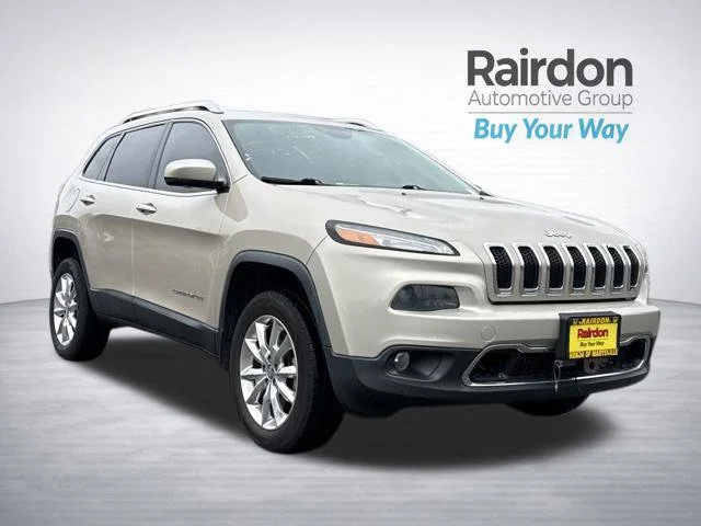 Used 2014 Cashmere Pearlcoat Jeep Limited image 1