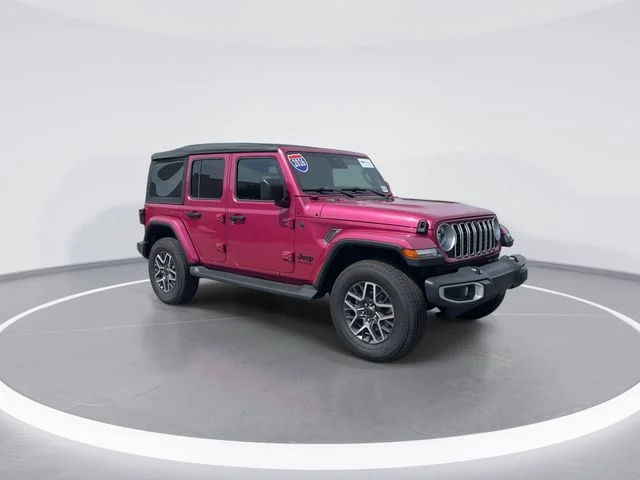 Used 2026 Red Jeep Sahara image 1