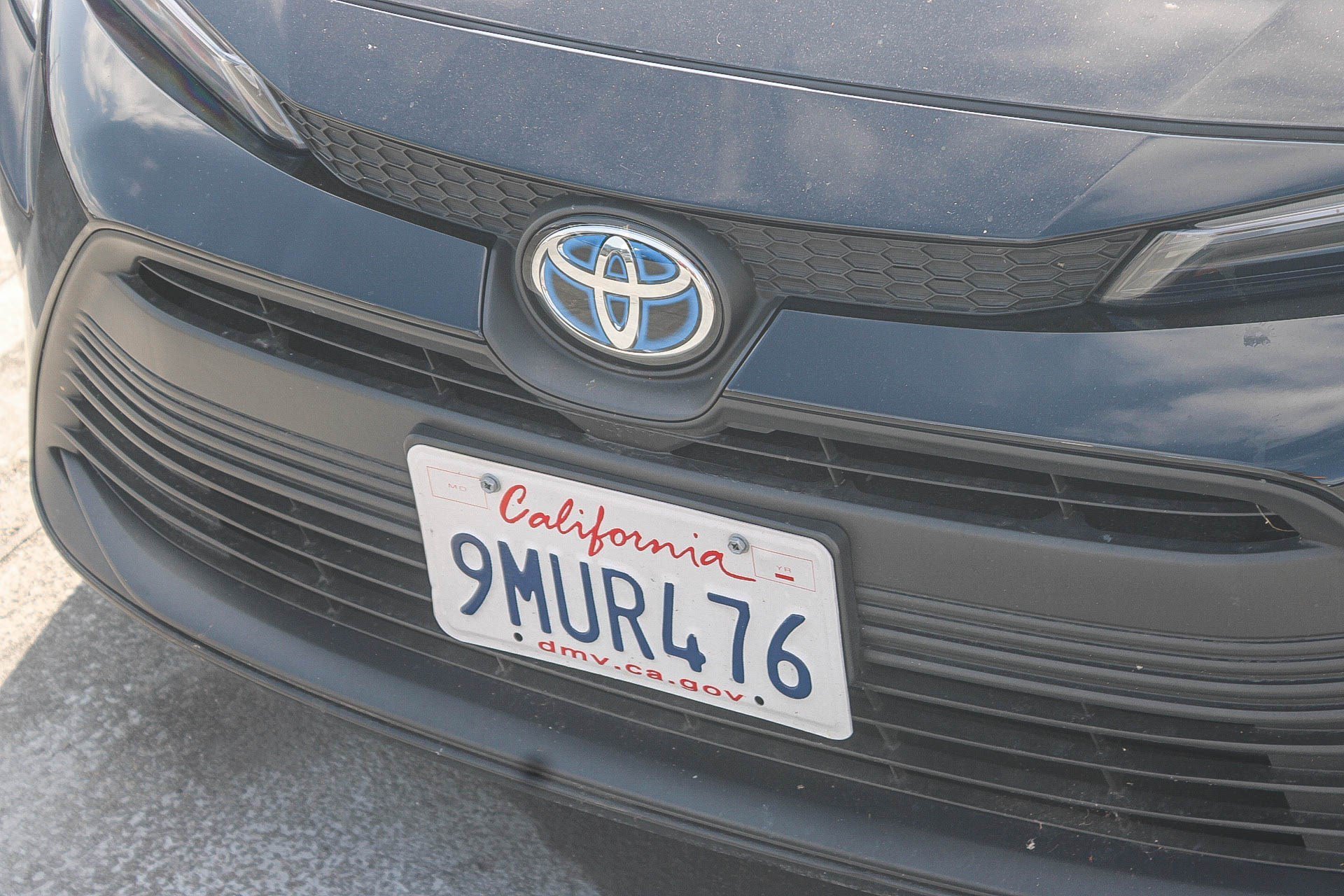 Used 2024 Midnight Black Metallic Toyota Hybrid LE image 6