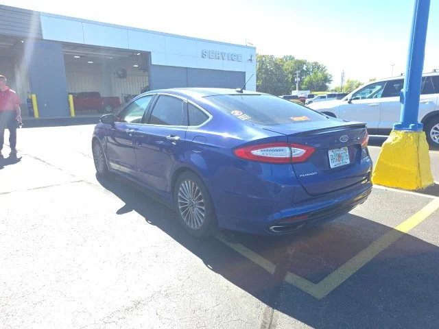 Used 2013 Blue Ford Titanium image 3
