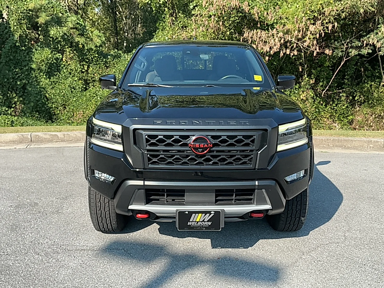 Used 2024 Super Black Nissan Crew Cab PRO-4X 4x4 image 18
