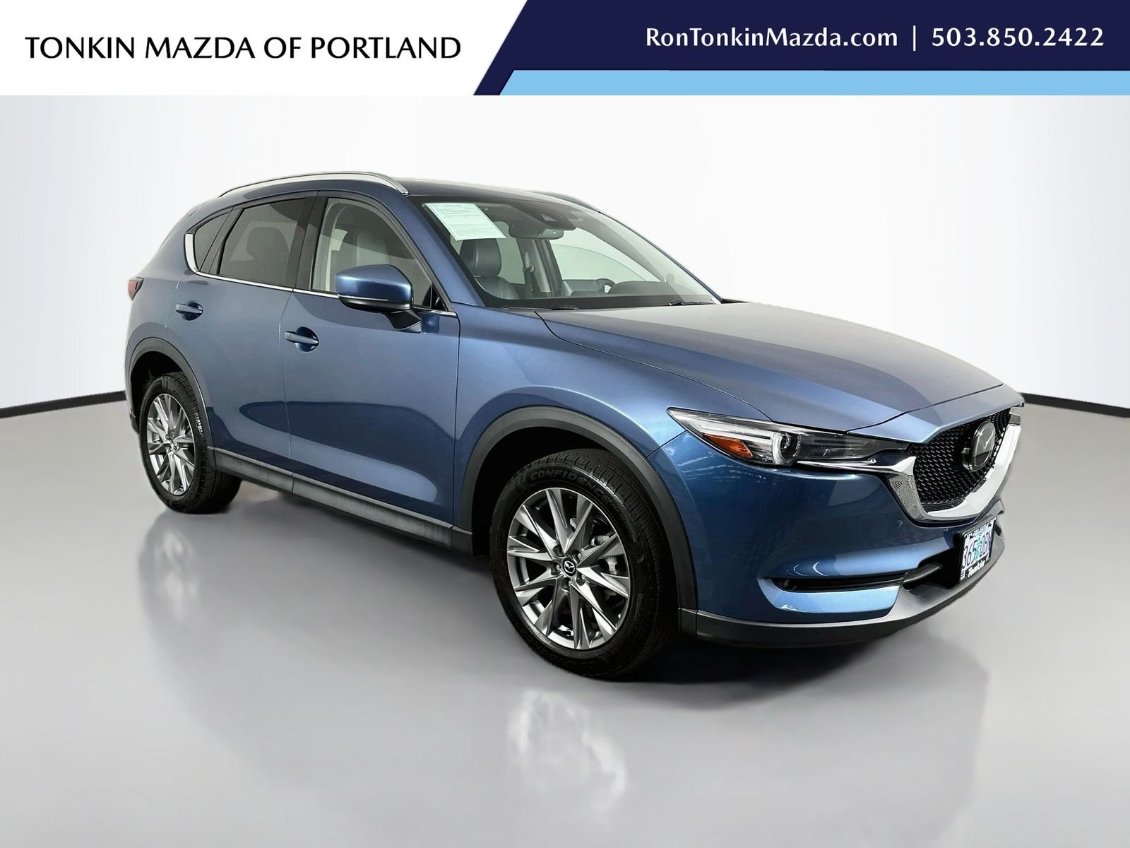 Used 2021 Eternal Blue Mica Mazda Grand Touring image 1