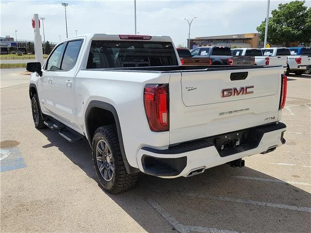 Used 2025 Summit White GMC AT4 4x4 Crew Cab 5.75 ft. box 147.4 in. WB image 4