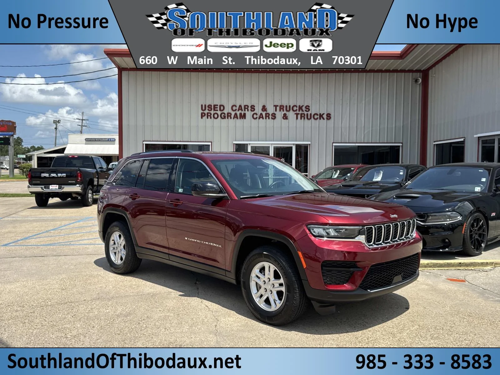 Used 2024 Velvet Red Pearlcoat Jeep Laredo image 1