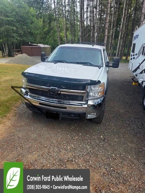 Used 2010 White Chevrolet LTZ image 1