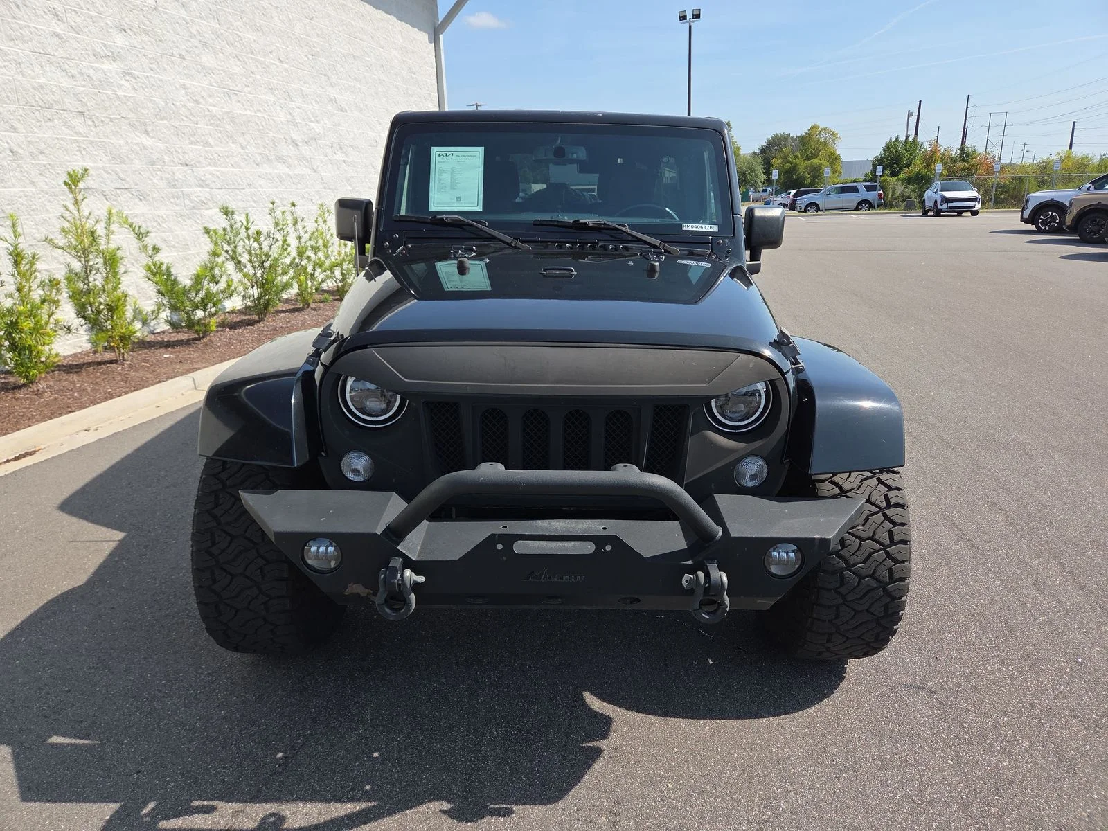 Used 2016 Black Clearcoat Jeep Unlimited Sahara image 9