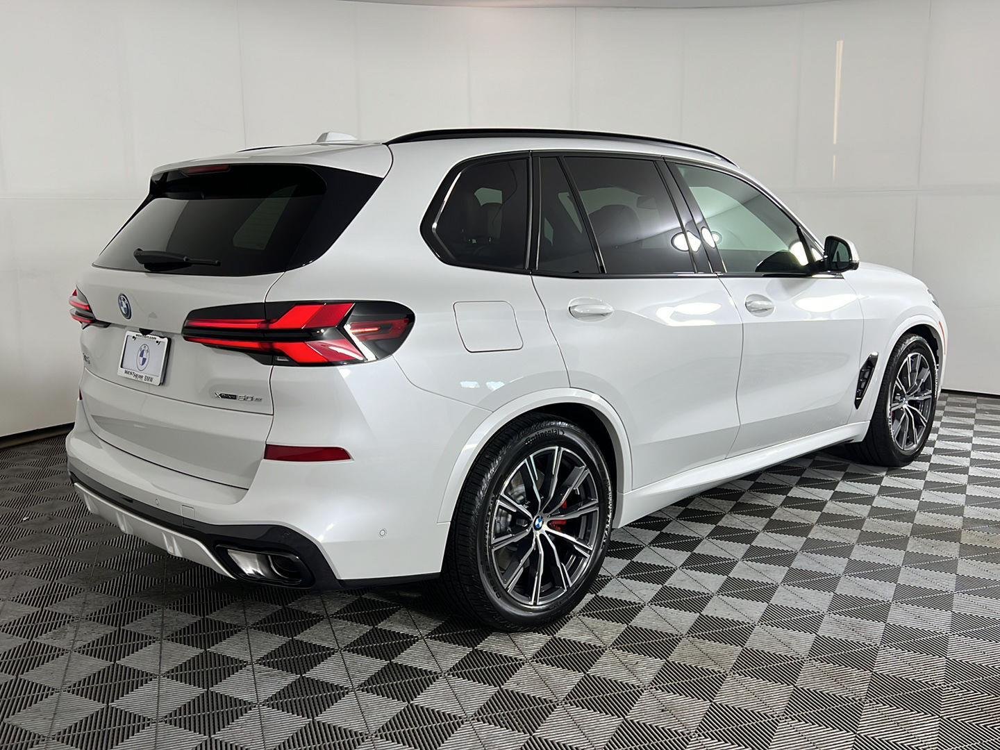 Used 2026 Mineral White Metallic BMW xDrive50e image 17