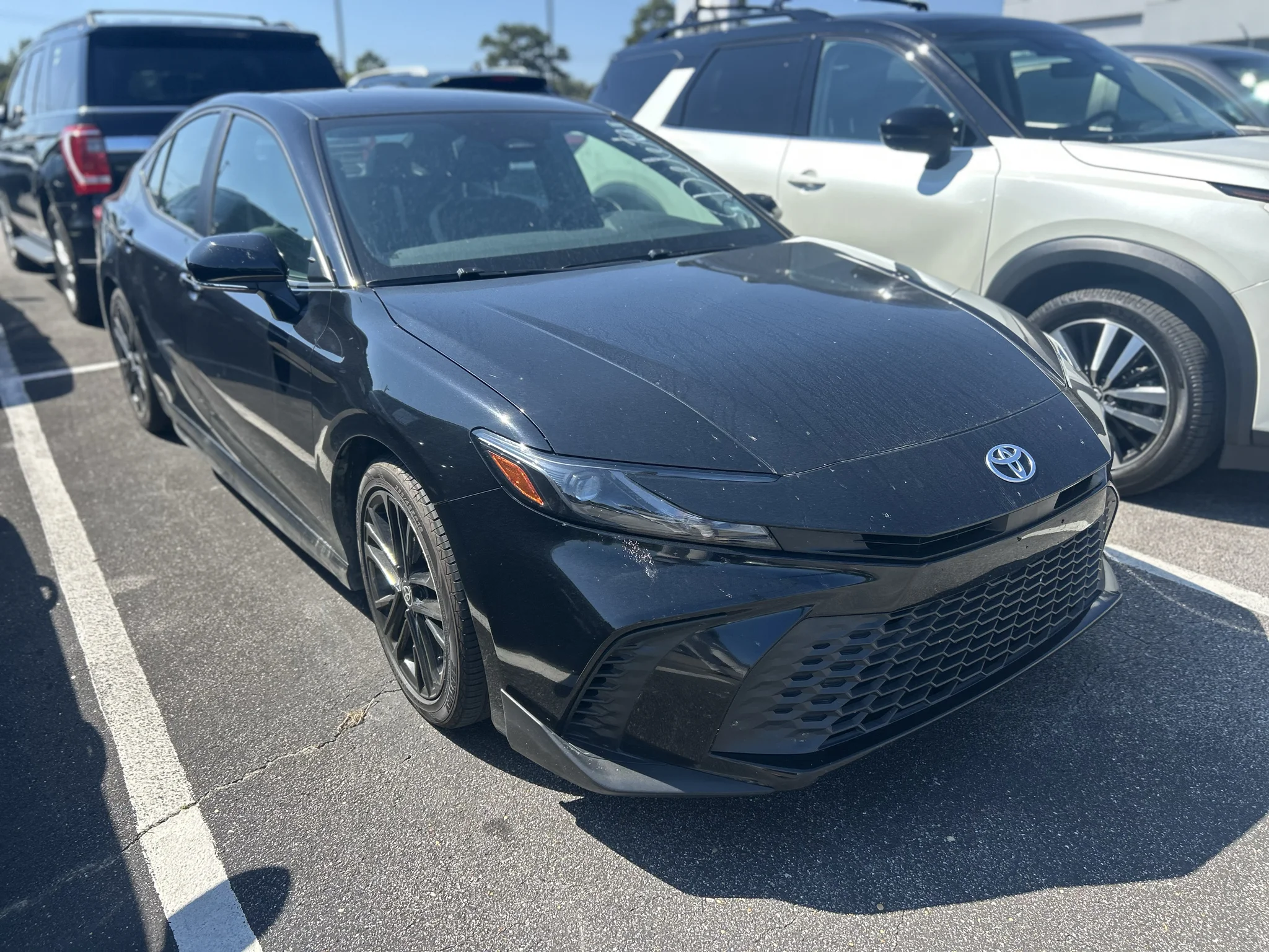 Used 2025 Midnight Black Metallic Toyota SE image 4
