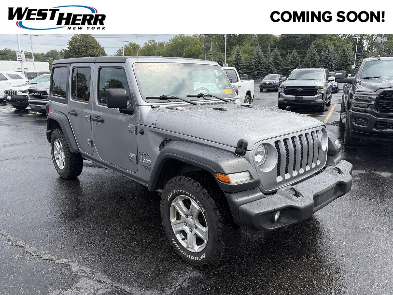 Used 2018 Billet Silver Metallic Clearcoat Jeep Sport S image 1