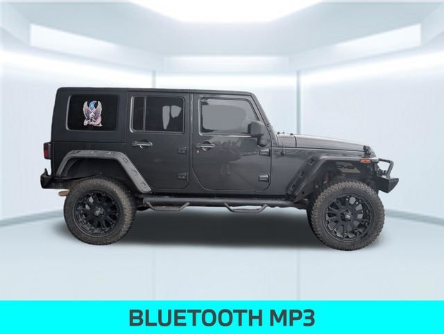 Used 2010 Jeep Wrangler Unlimited Sport with VIN 1J4BA3H13AL139733 for sale in Milton, FL