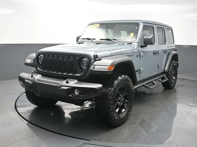 Used 2024 Gray Jeep Sport image 1
