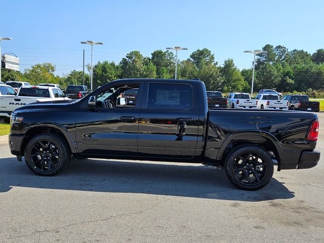 New 2026 Diamond Black Crystal Pearl-Coat Exterior Paint RAM Laramie image 5