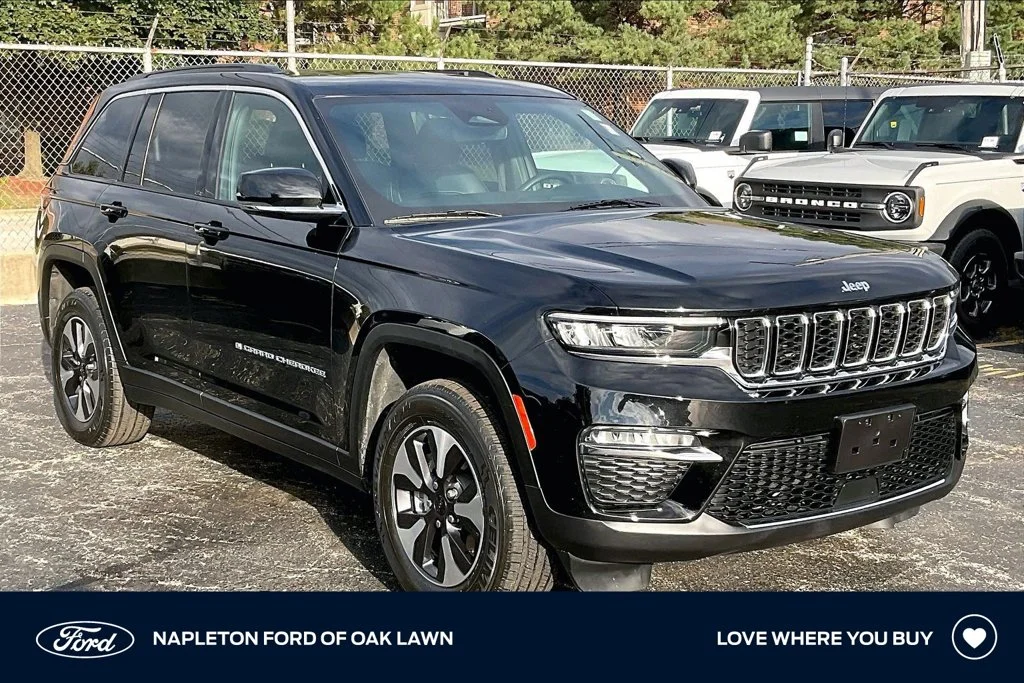 Used 2024 Diamond Black Jeep 4xe image 1