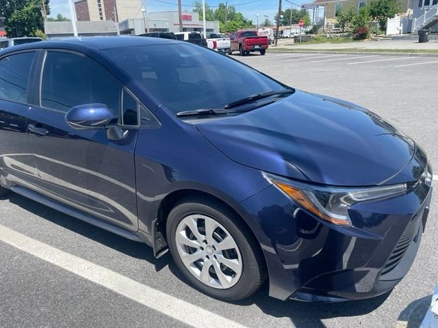 Used 2024 Blue Toyota LE image 1