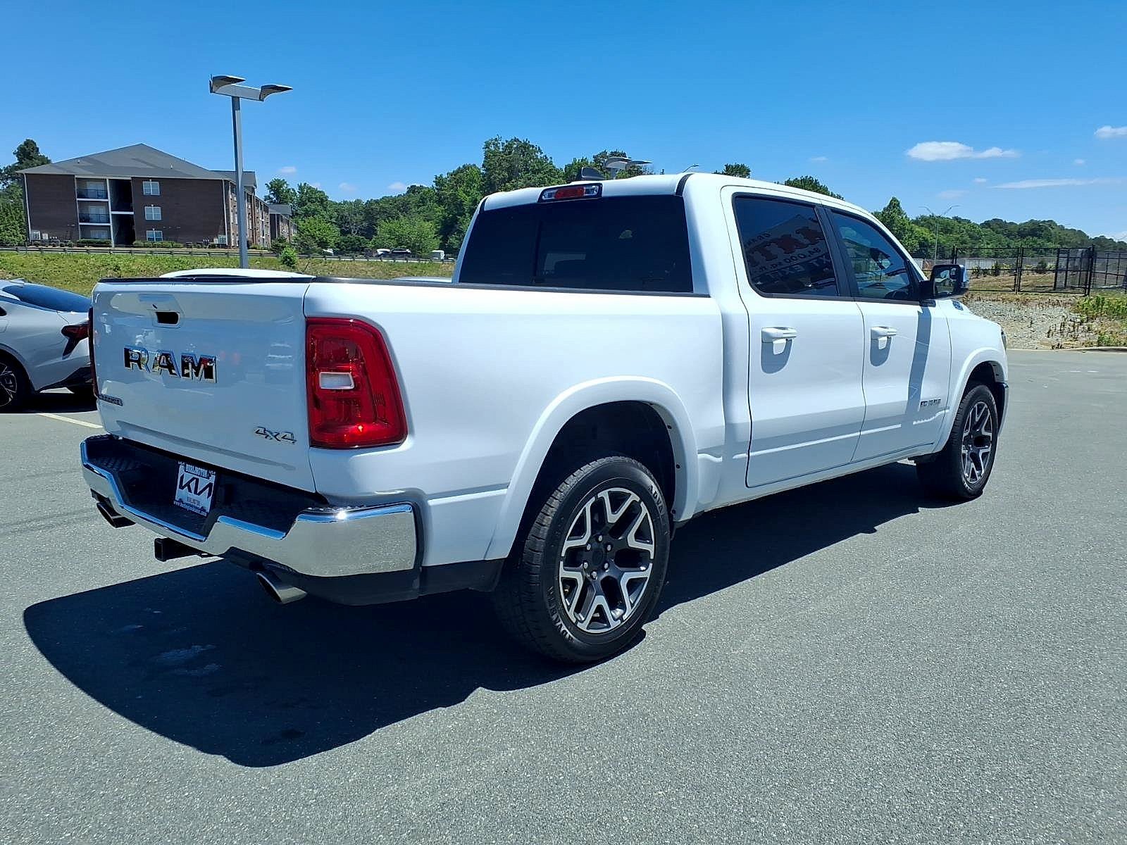 Used 2025 Bright White Clearcoat Ram Laramie Crew Cab 4x4 5