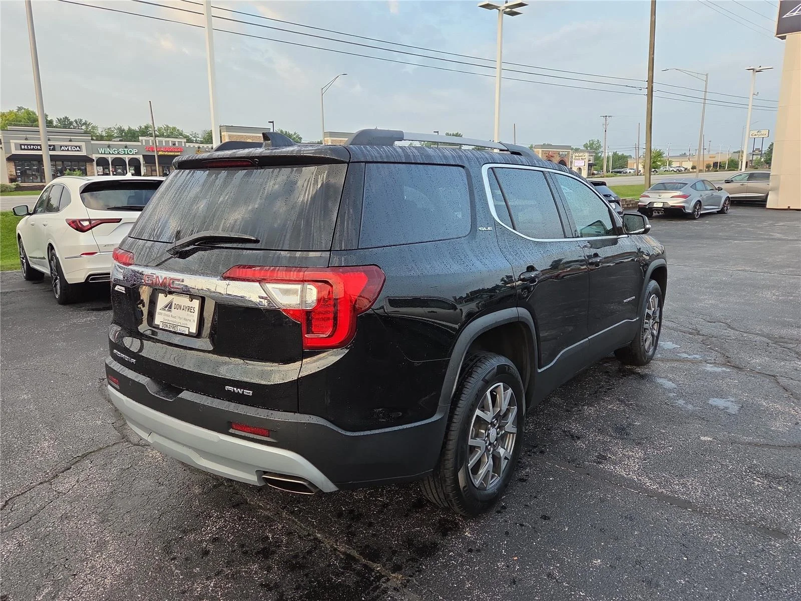 Used 2023 Ebony Twilight Metallic GMC SLE image 29