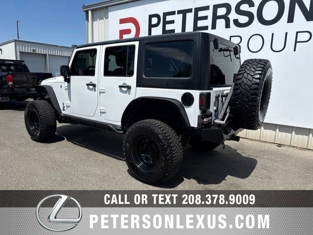 Used 2013 White Jeep Unlimited Sport image 6
