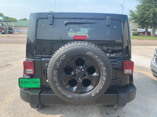 Used 2014 Black Jeep Unlimited Sahara Dragon Edition image 3