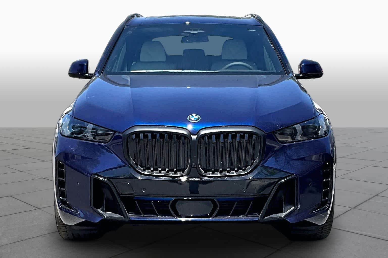 New 2026 Tanzanite Blue II Metallic BMW xDrive50e image 3