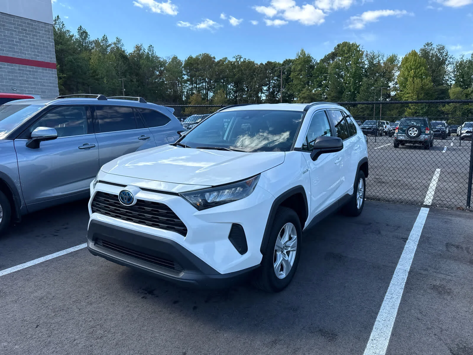 Used 2021 Super White Toyota Hybrid LE image 6