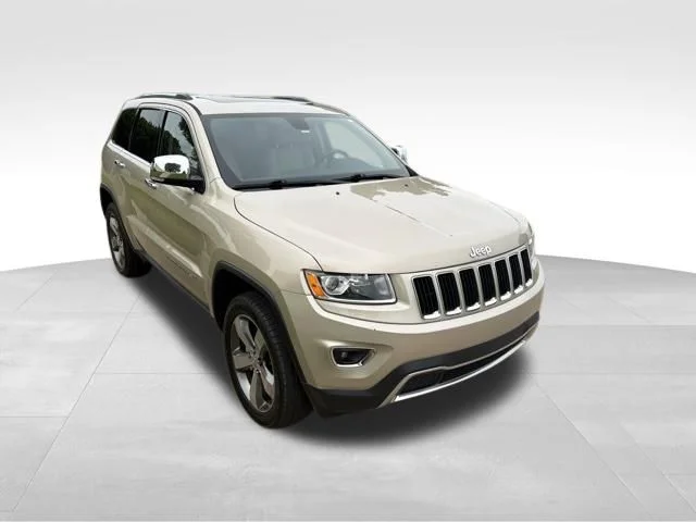 Used 2015 Beige Jeep Limited image 1