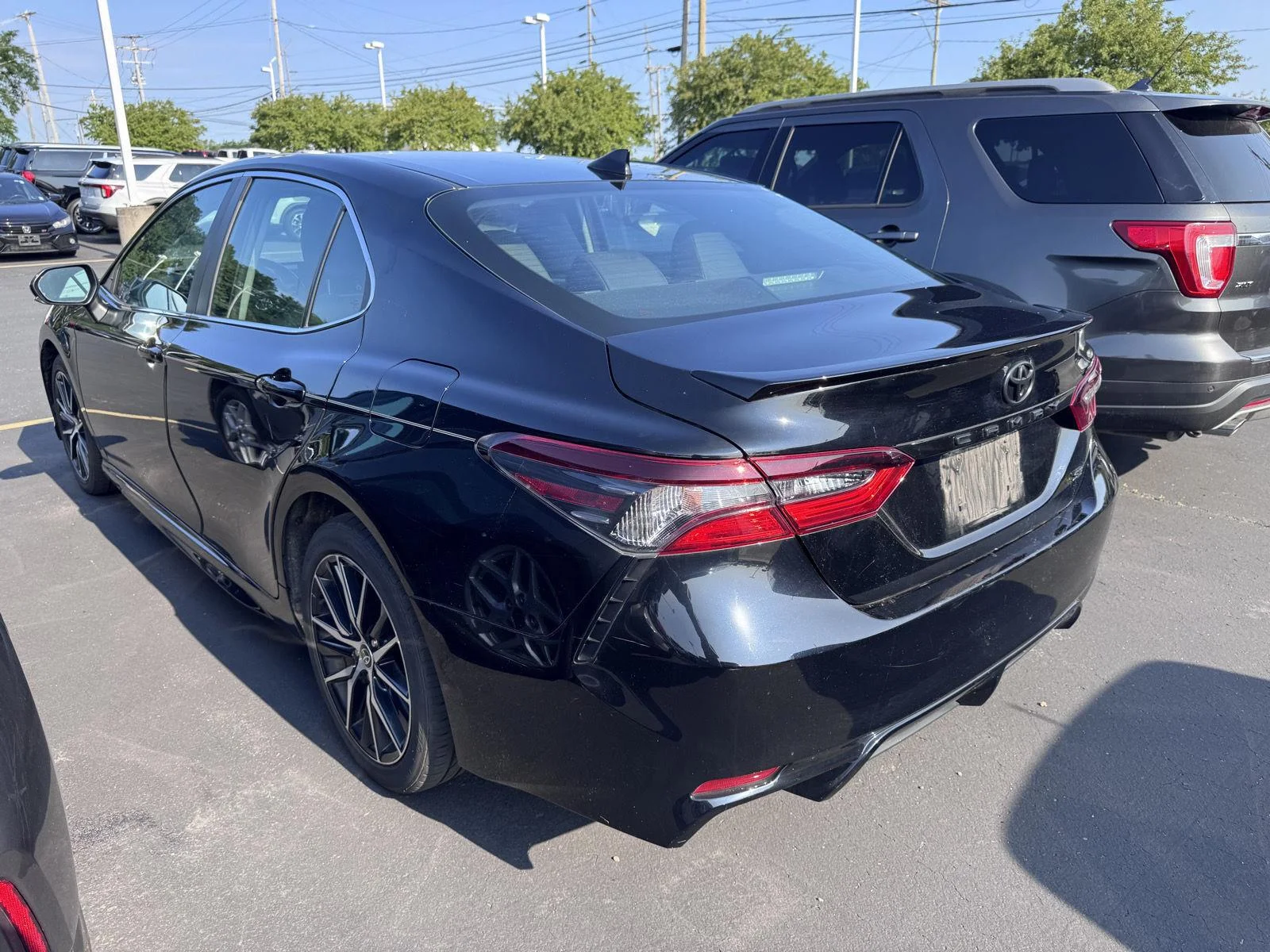 Used 2021 Midnight Black Metallic Toyota SE image 7