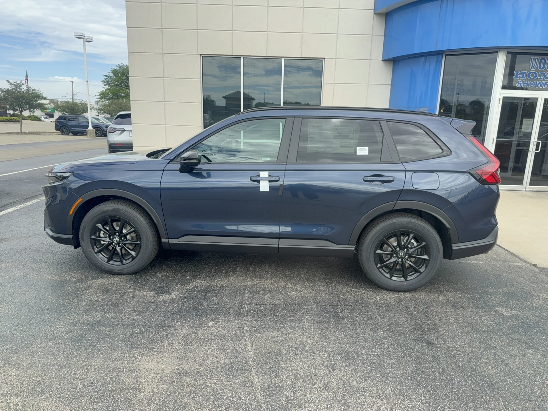 New 2026 Canyon River Blue Metallic Honda Sport-L image 8