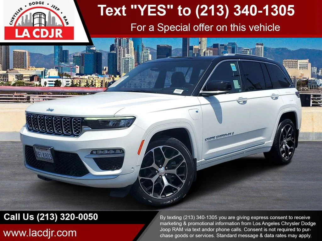 Used 2022 White Jeep Summit Reserve 4xe image 1