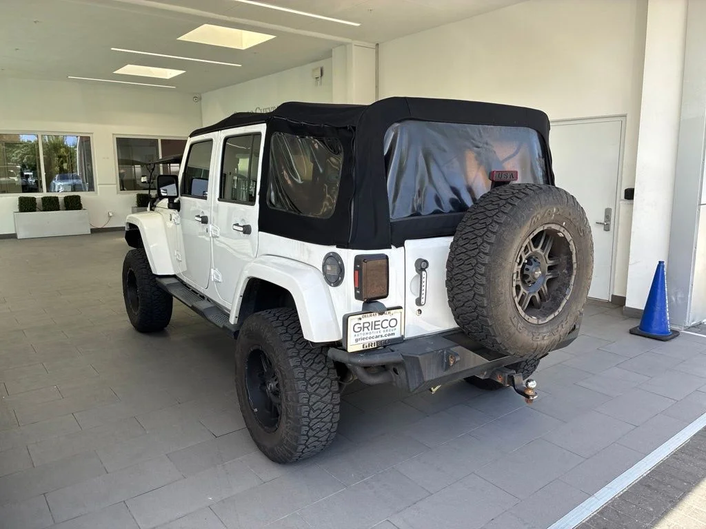 Used 2016 White Jeep Unlimited Sahara image 4