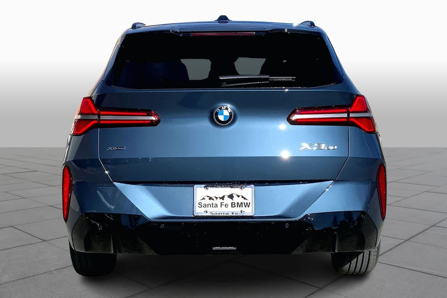 New 2026 Arctic Race Blue metallic BMW 30 xDrive image 4