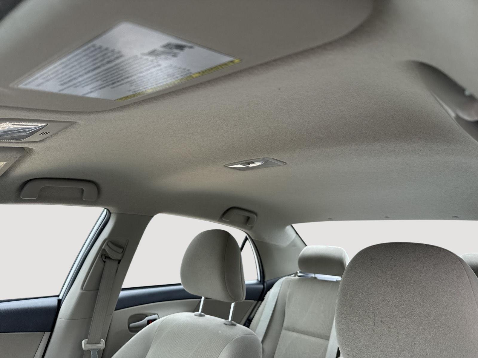 Used 2013 Super White Toyota LE image 21