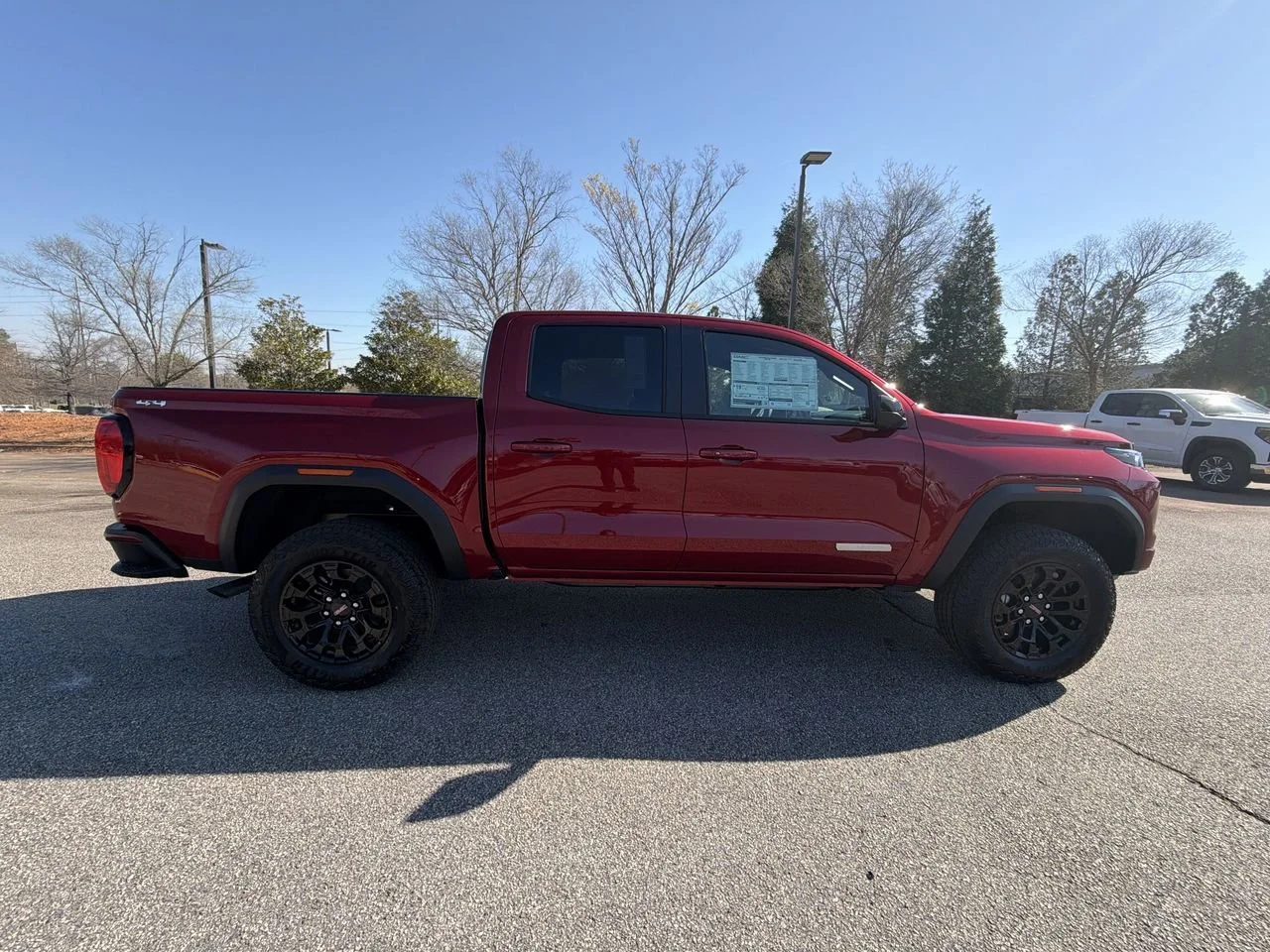 New 2026 Volcanic Red Tintcoat GMC Elevation image 9