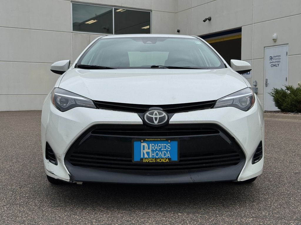 Used 2017 Toyota Corolla LE with VIN 5YFBURHE9HP638489 for sale in Coon Rapids, Minnesota