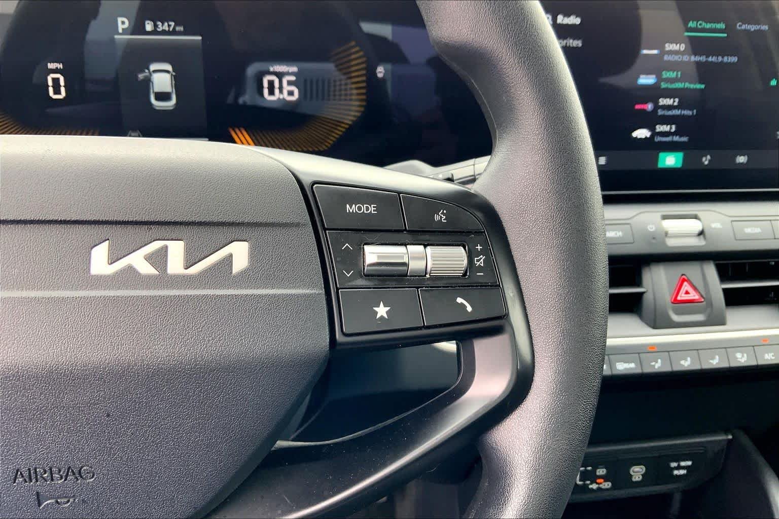 Used 2025 Snow White Pearl Kia LXS image 25