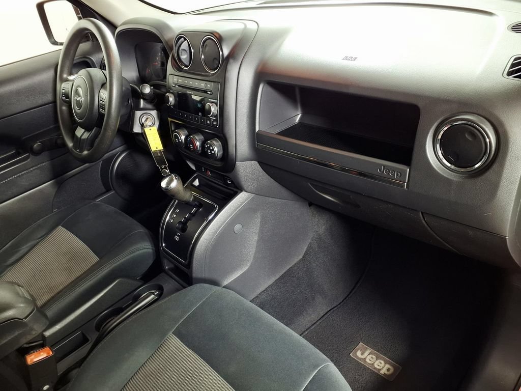 Used 2011 Deep Cherry Red Jeep Sport image 14