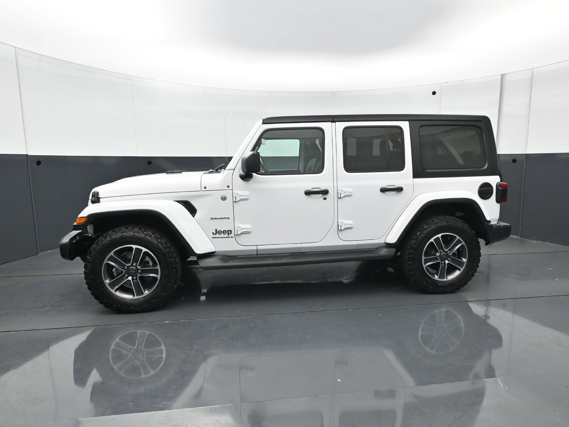 Used 2023 Jeep Wrangler 4-Door Sahara with VIN 1C4HJXEG6PW681898 for sale in Minneapolis, Minnesota