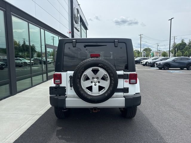 Used 2011 White Jeep Unlimited Sahara image 4